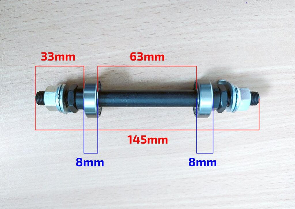 OŚ KOŁA PRZÓD MTB - ŁOŻYSKA MASZYNOWE 10x145mm